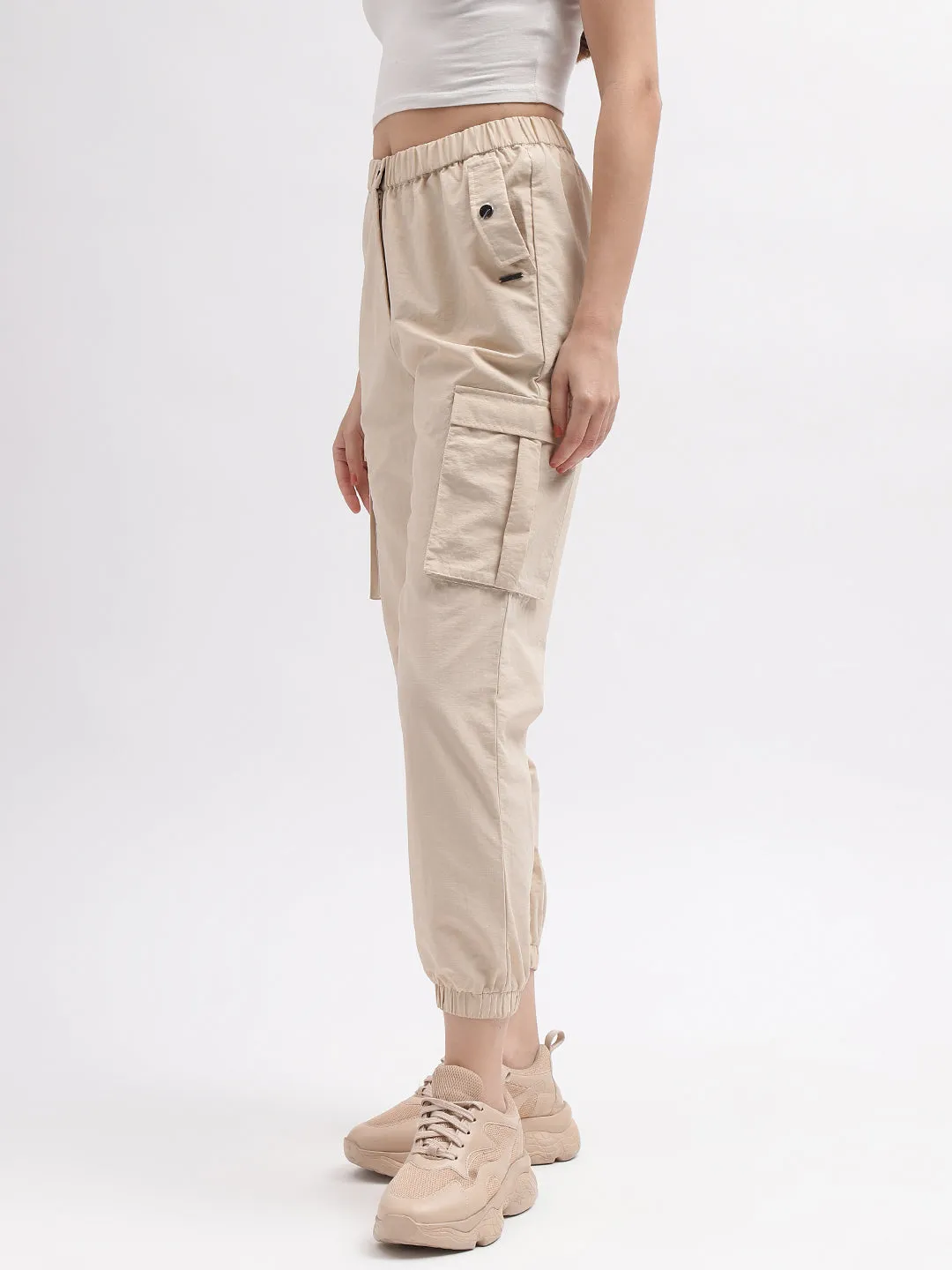 Iconic Women Beige Solid Regular Fit Mid-Rise Trouser