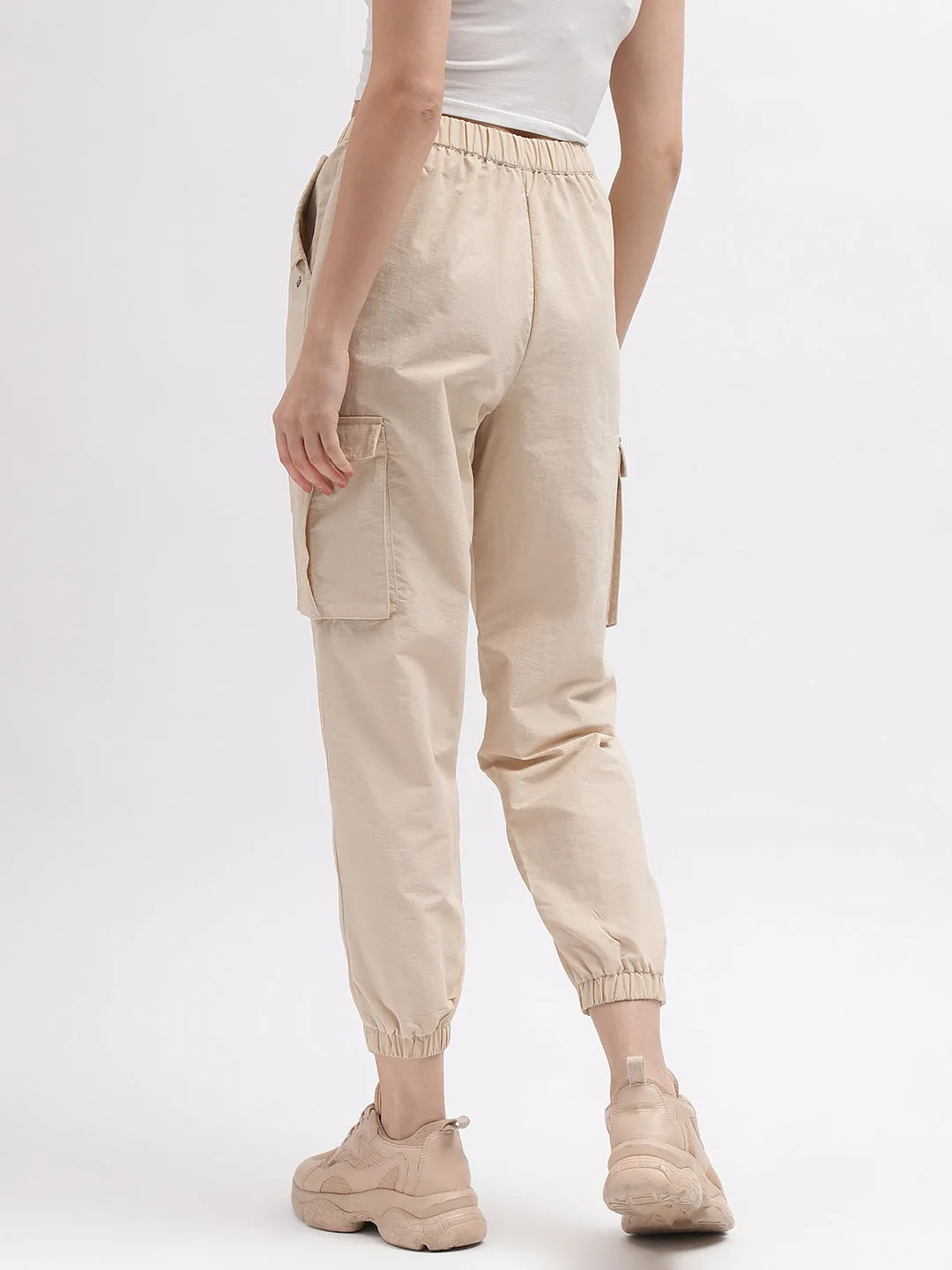 Iconic Women Beige Solid Regular Fit Mid-Rise Trouser