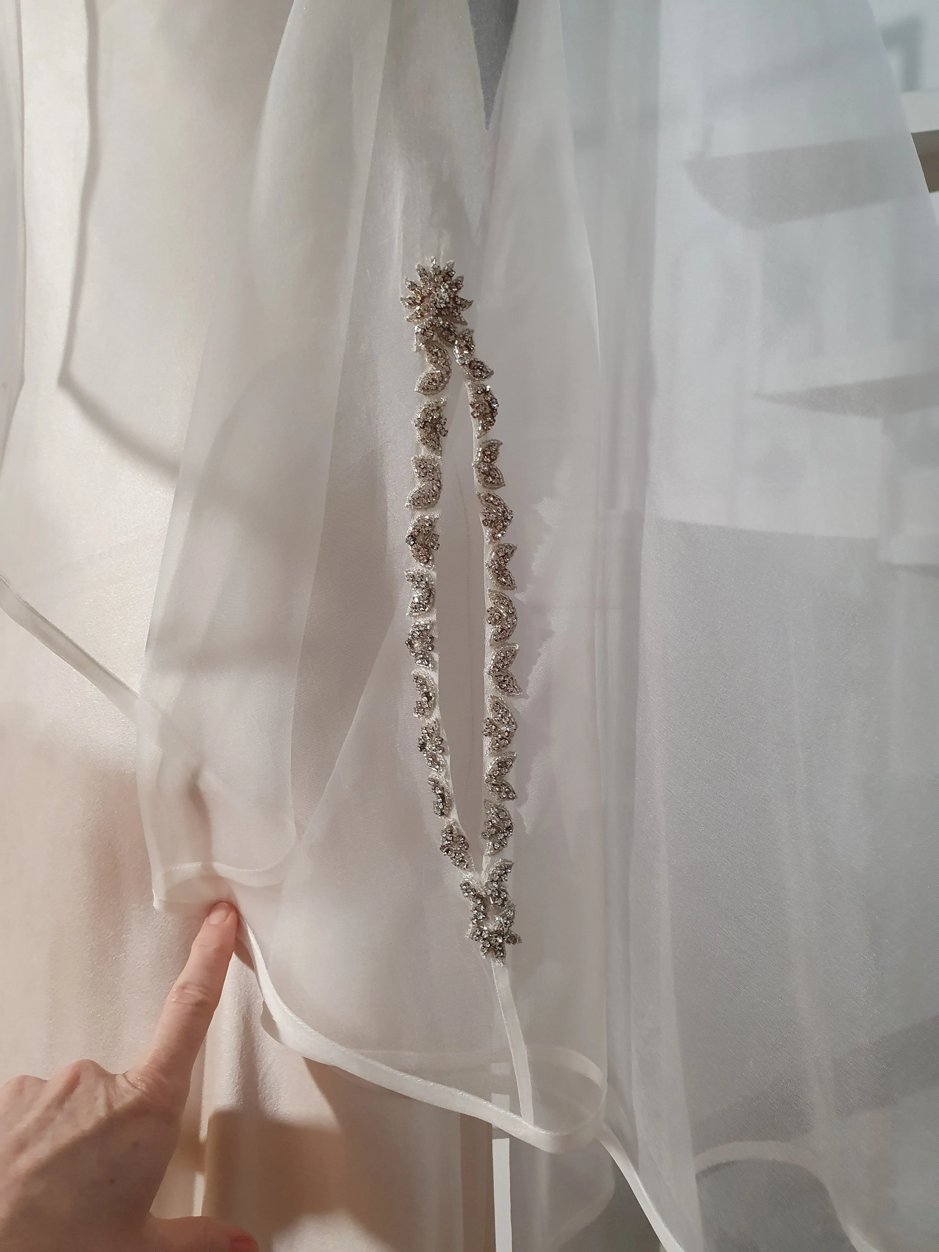 VC9: Silk organza veil cape with crystal details at neck and arm holes